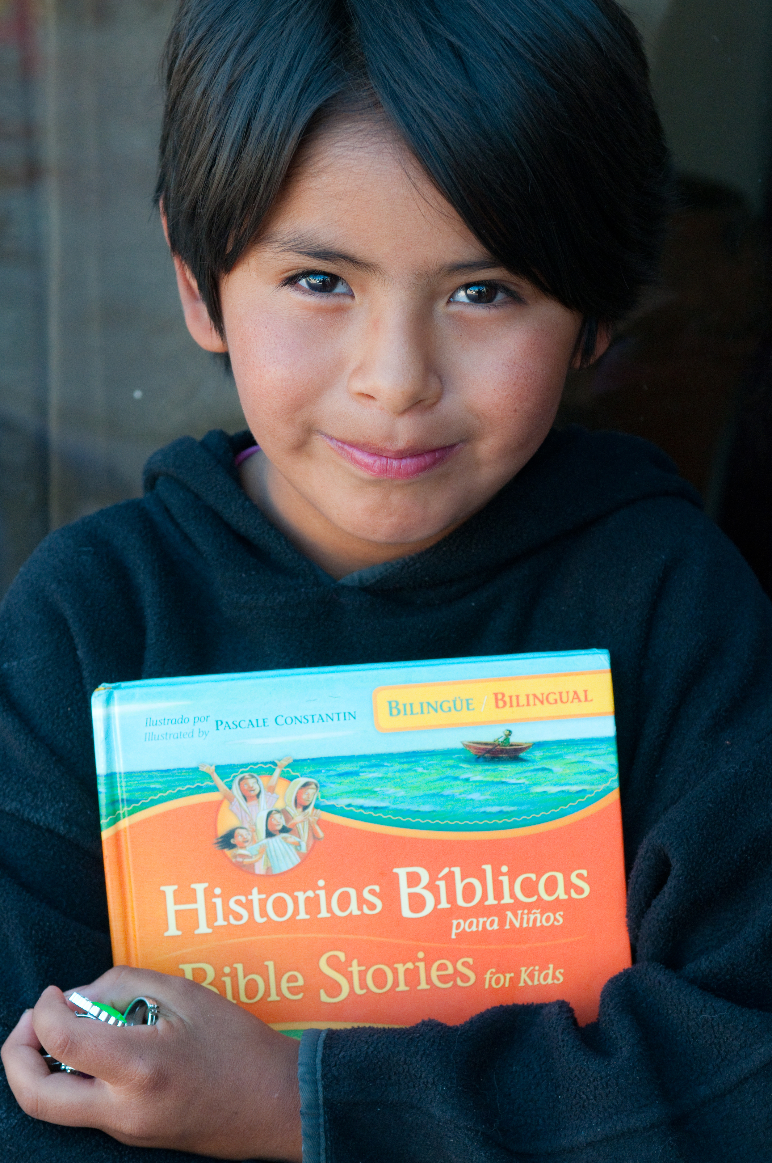  Jasmin and the bilingual Bible stories book. 