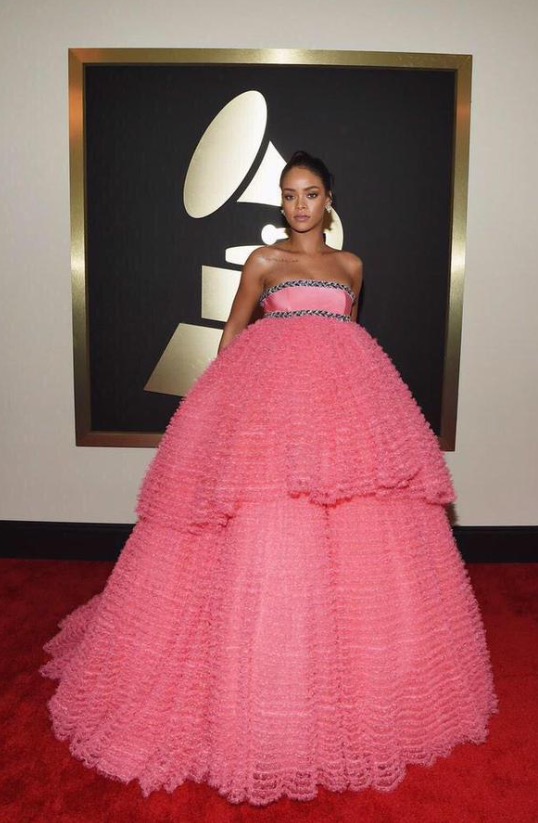 Rihanna was pretty in pink, perhaps a bit too much emphasis on pretty and sweet, as the look reminds us of a Quinceñeara dress. The makeup artist delivered elegance, but the tulle overload on the dress left too much to be desired. *Lola's Notes:* FLASH BACK TO MY QUINCE circa 2007