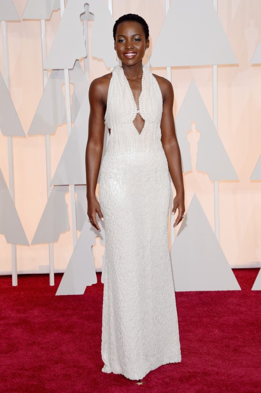 Lupita Nyong’o beamed, looking like an elegant pearl of the sea. The best part of this look was Lupita’s toned arms and glowing skin.