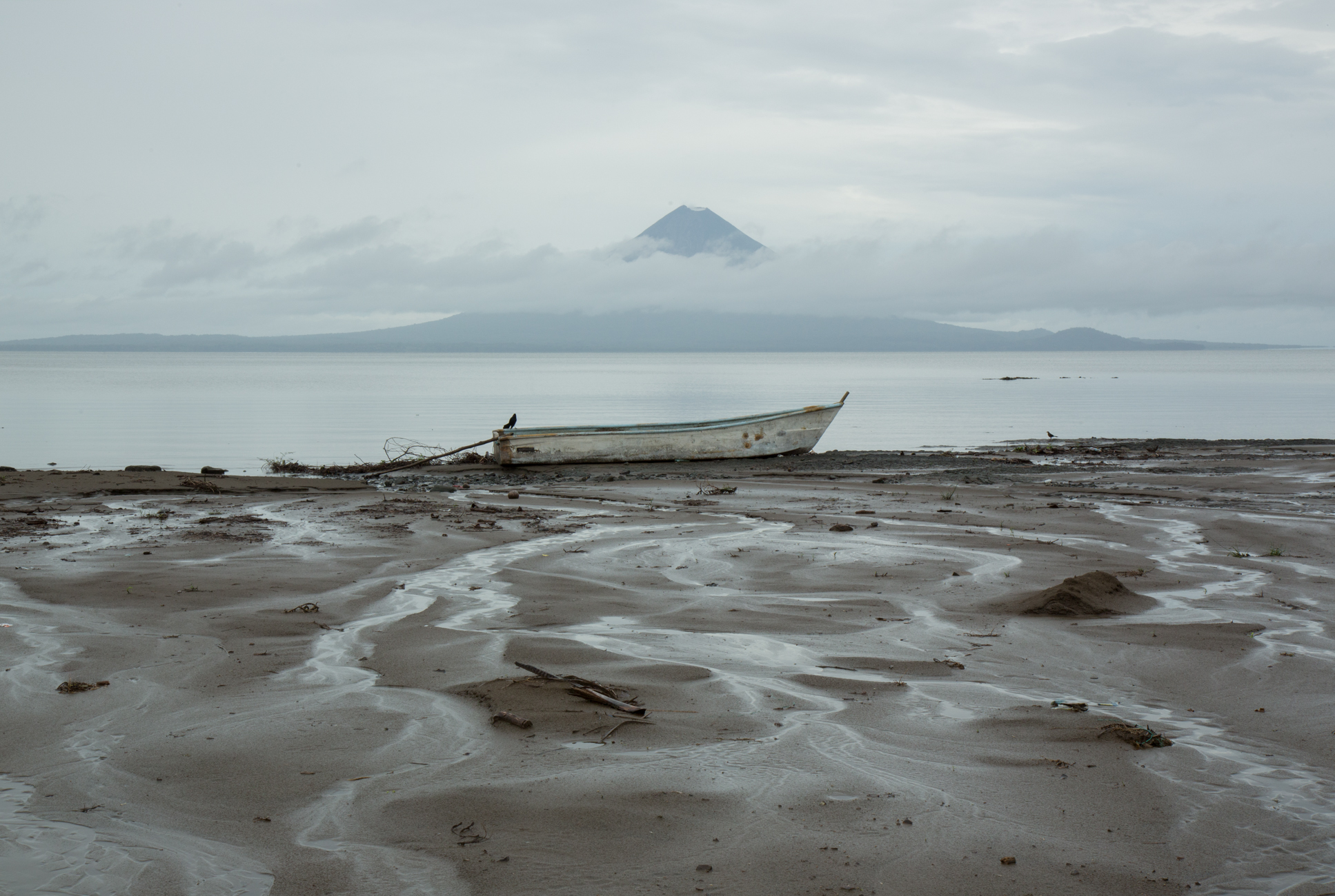  &nbsp;On the shores of Lake Nicaragua with the twin peaks of Ometepe Island in the distance near Rivas, Nicaragua&nbsp; 