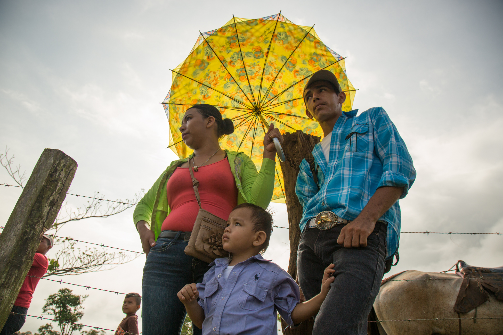  renor Jose Gonsales Rivas, 19 and his wife Irma Aguilar Garcia with their son at a market day in Palo Bonito where they sell goods on the banks of the Punta Gorda river in the early morning. If the Gran Canal project were to go forward, the river wo