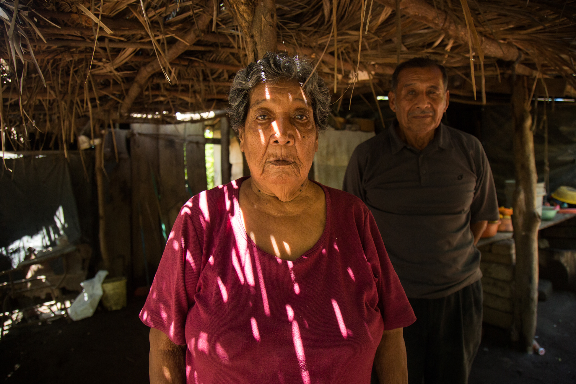  Egdomilia Mora Hernandez at home with her husband. A native of Ometepe Island, she promises to defend her land to the death if the government forces her and her family off of it due to construction of the Interoceanic Canal.&nbsp; 