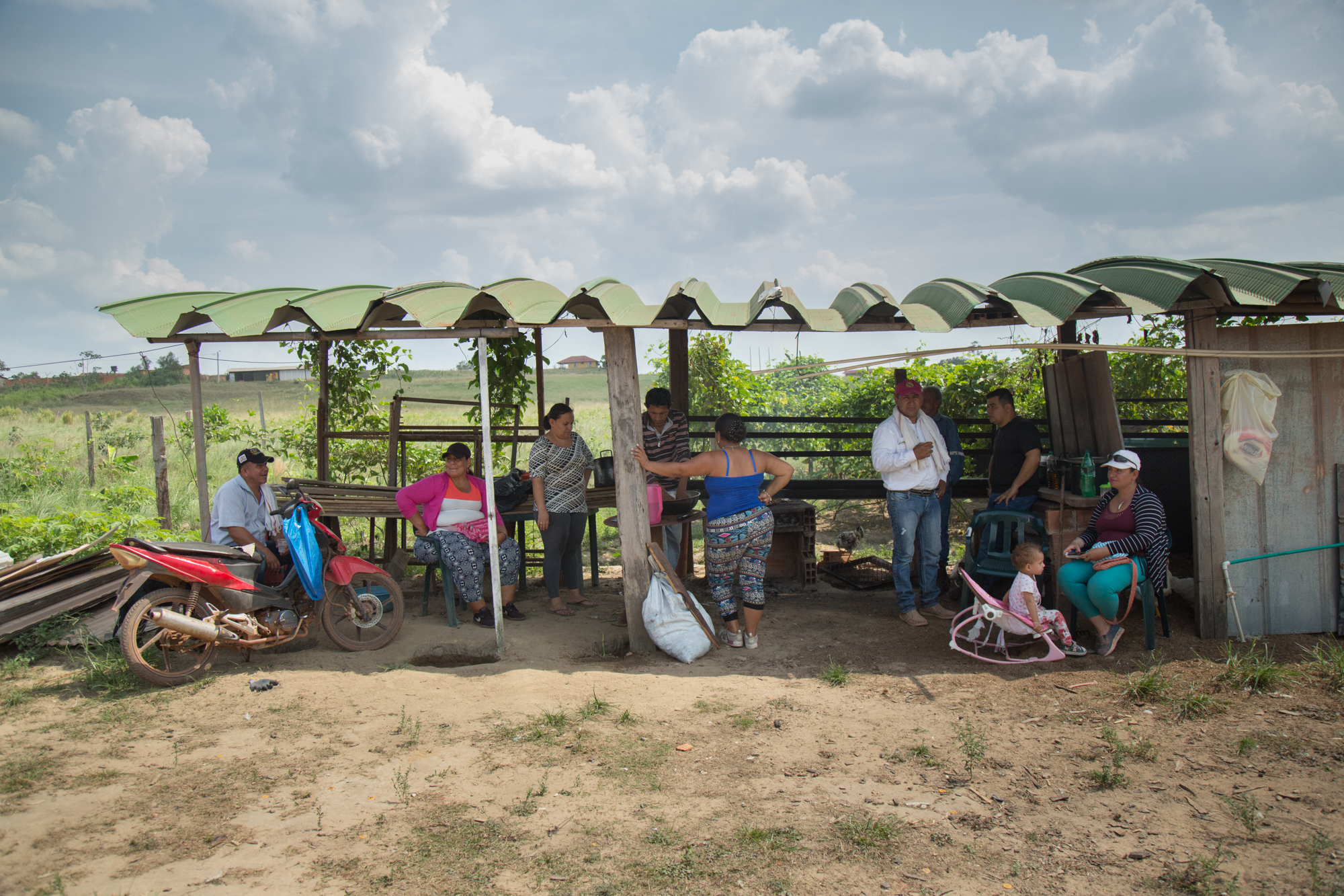  Héctor Sánchez spends time with frinds in his community during a mall barbeque on a Sunday afternoon. Rubiales, Meta, Colombia. April 9, 2017 