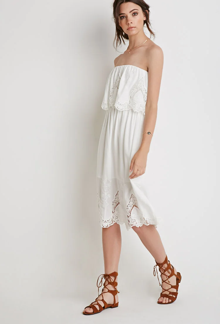   Floral Embroidered Strapless Dress , $34.90  Again another non-Contemporary find, but it's just too cute. I love the white and the ruffles and the embroidery.&nbsp; I see myself wearing it with a wide-brimmed sunhat while sipping a mojito at a trop