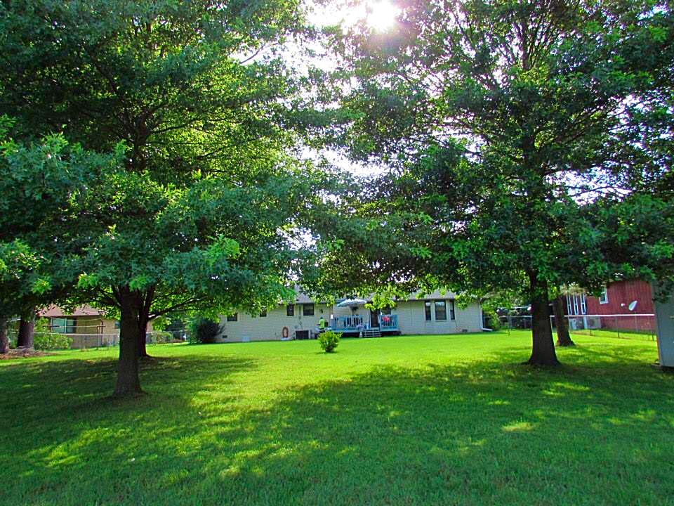  The grass is literally greener...Grandpa's backyard. They don't have them like this in CA. 