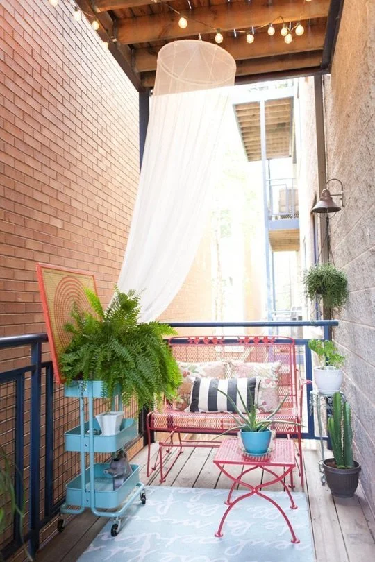  The hanging canopy is a nice touch - adds the illusion of some more privacy.&nbsp; And in our case if tacked down properly, would keep toys from going over the balcony railing...   
