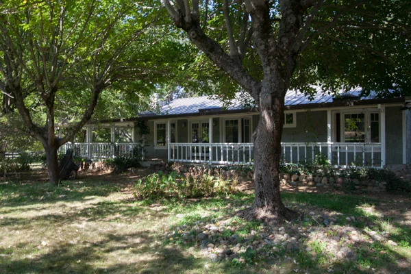 Enjoy the shade underneath the trees while putting your toes in the grass.