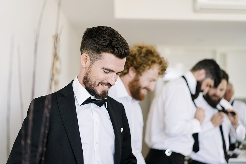 Groom &amp; Groomsmen getting ready at Sweetwater Apartments
