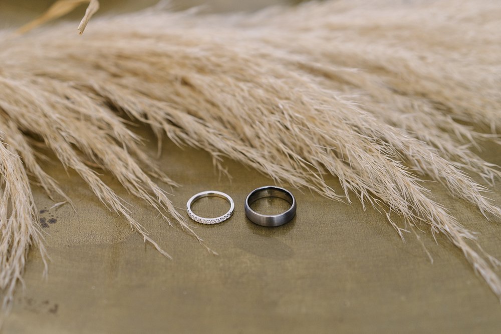 Wedding rings and pampas grass
