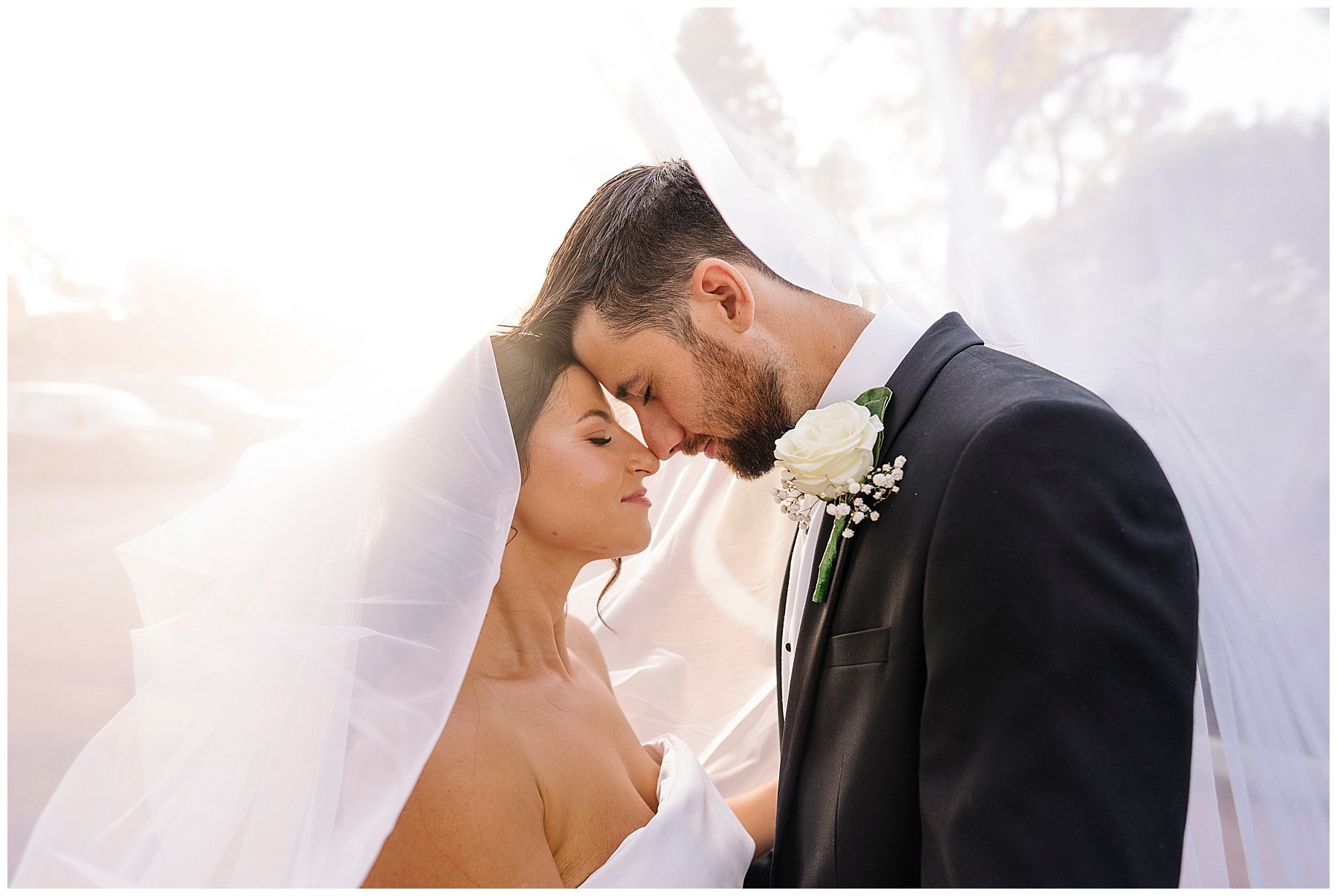 Bride and groom under veil at Masonmill, Perth Hills