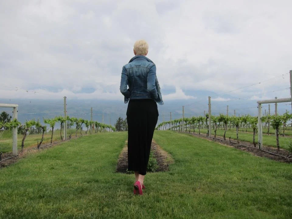 See, fabulous even with grapes. Here she is keeping an eye out for the next batch of green wine.