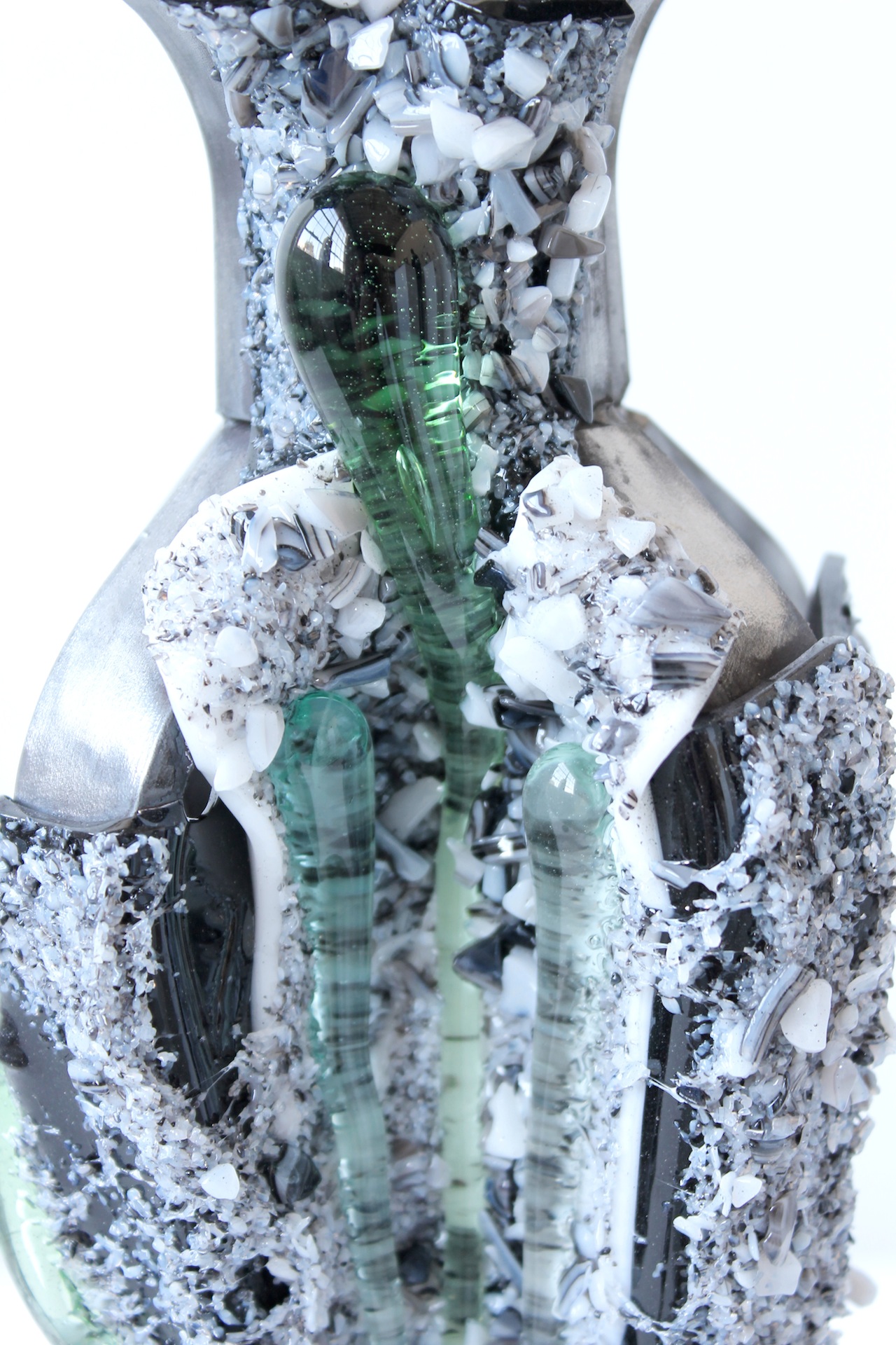 2015, "Ice Jacket" series. Kiln glass over steel armatures. "Ice Jackets" look at the reflective qualities of the glass, as well as referencing artifacts found along the banks of the Penobscot river after recent dam removals. The