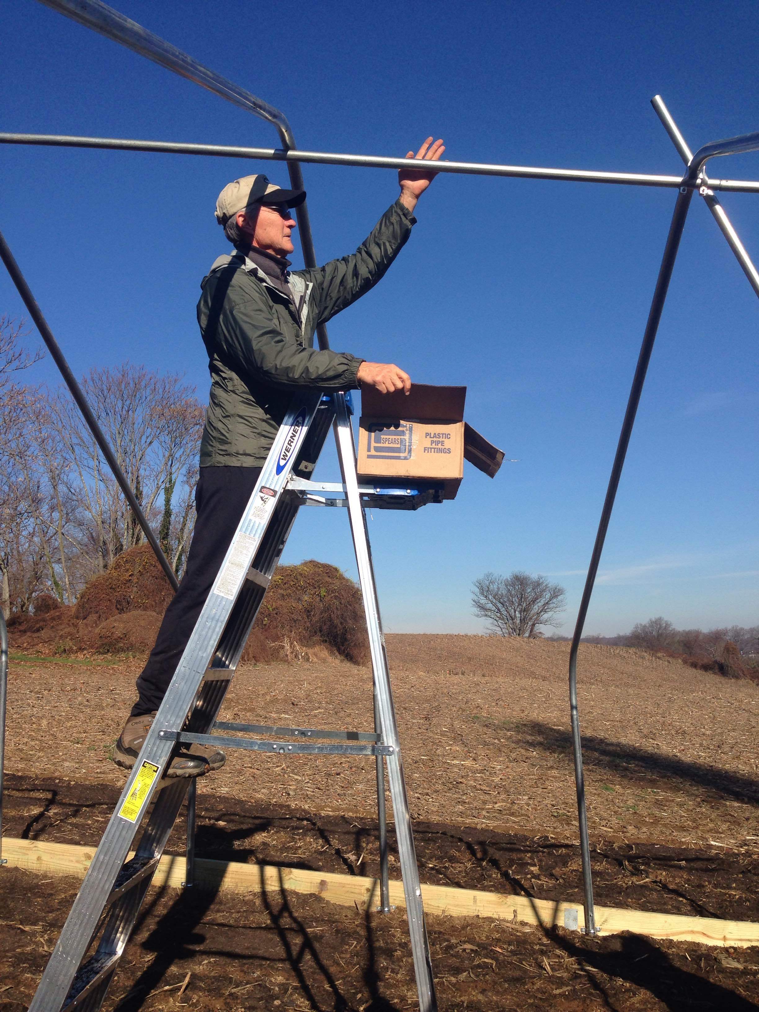Dennis of Greenstone Fields hopped up on the ladder right away. He knew what he was doing, too!