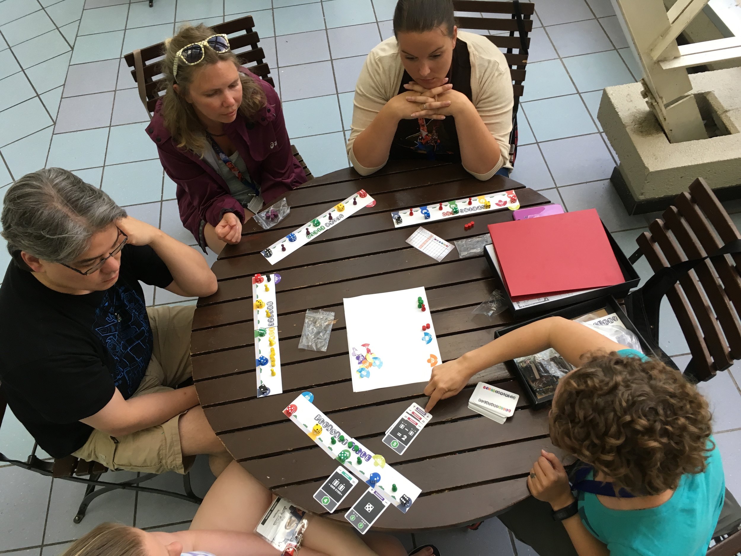 Here the booth team is getting in a play test of a new J. Alex Kevern game we are releasing in 2017.