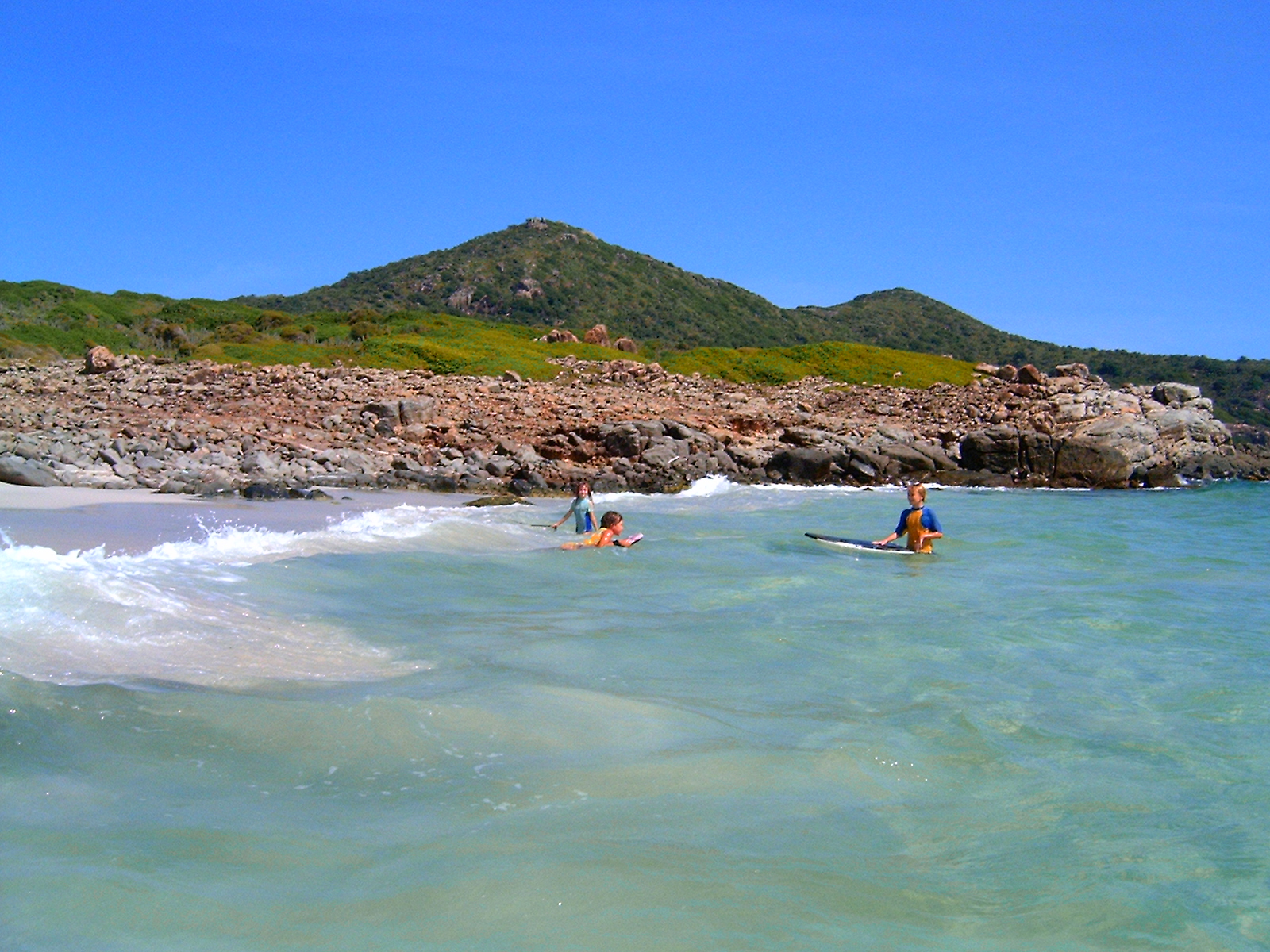 BODY SURFING BY THE SAND DUNES