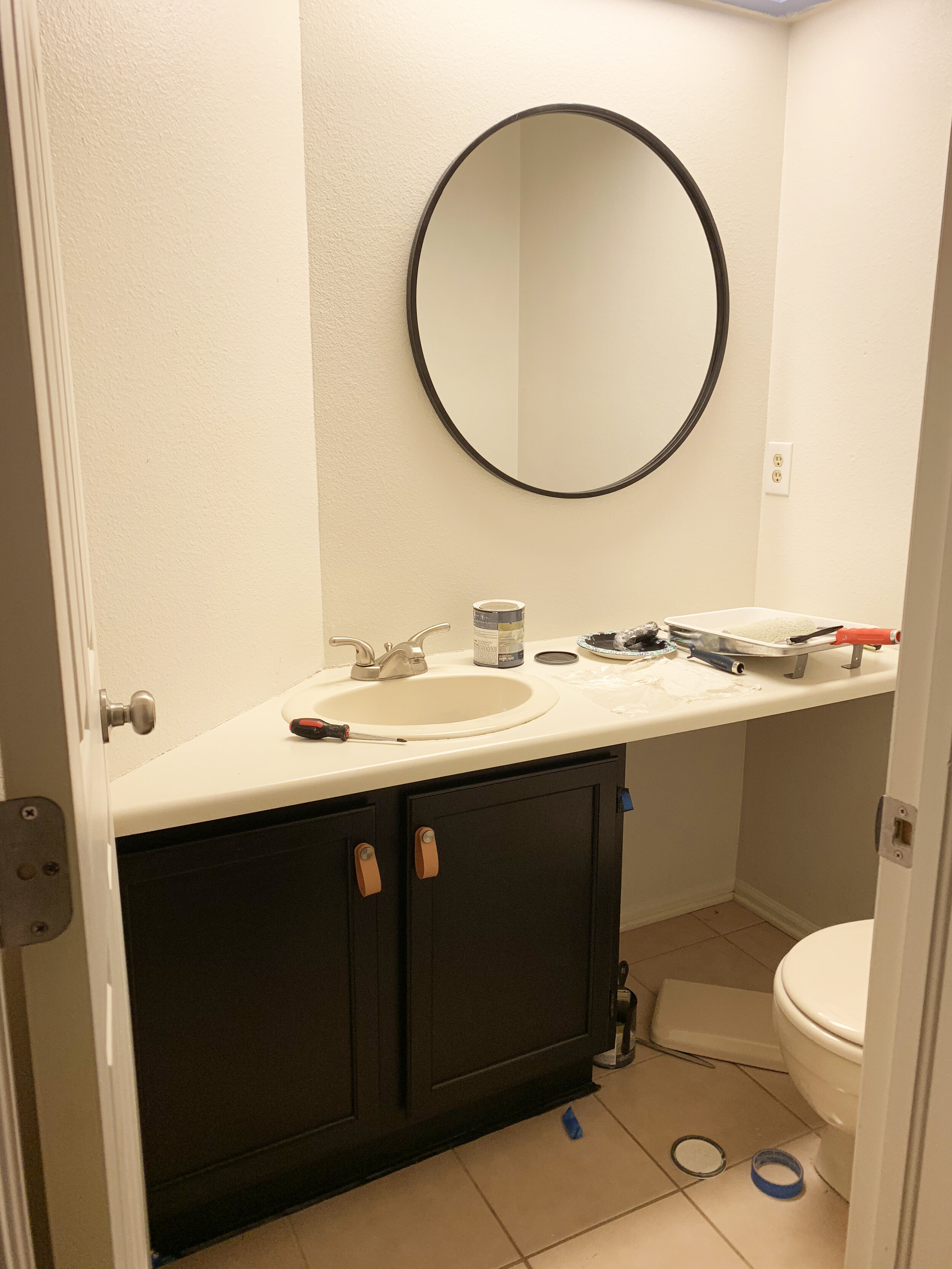  With this weird angled wall and sink placement, it was a debate on where the mirror should actually go. It landed on the bigger wall, and thats where it stayed. Definitely the better option after it was balanced out with some hooks and hand towels. 