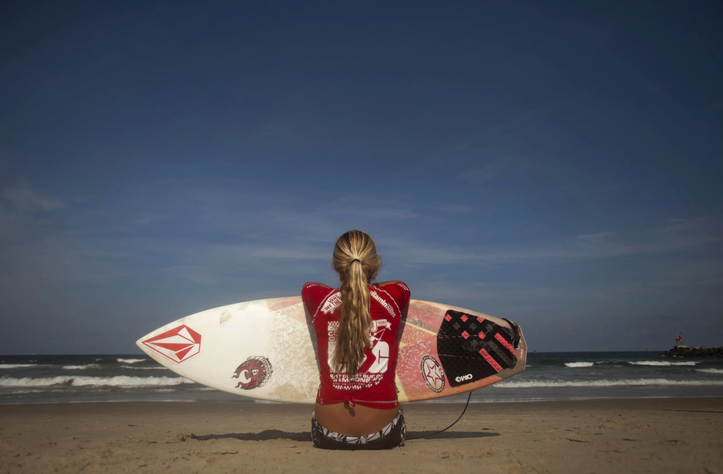 2012, Kayla Durden of Fl., waits on the beach for the start of her Viridian Women Pro Heat, at the East Coast Surfing Championships.