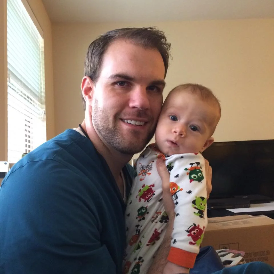 Snuggles with daddy before we left