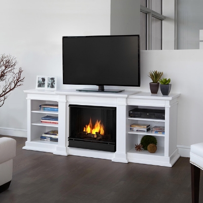 (6) Double Duty - Look, Ma! It's a TV Stand, and a fireplace! Via Overstock.com