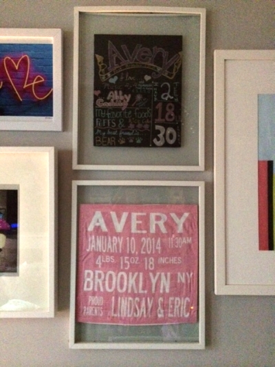 Top is a Baby's First Birthday chalkboard made with love by my sister Jillian, #jillofalltrades ! Learn how to make one here . Bottom is a custom pillowcase made by BabyBox given to Avery by my best friend. I wanted to save it from getting ruined, so I decided to preserve it in a frame and display it as art instead. 