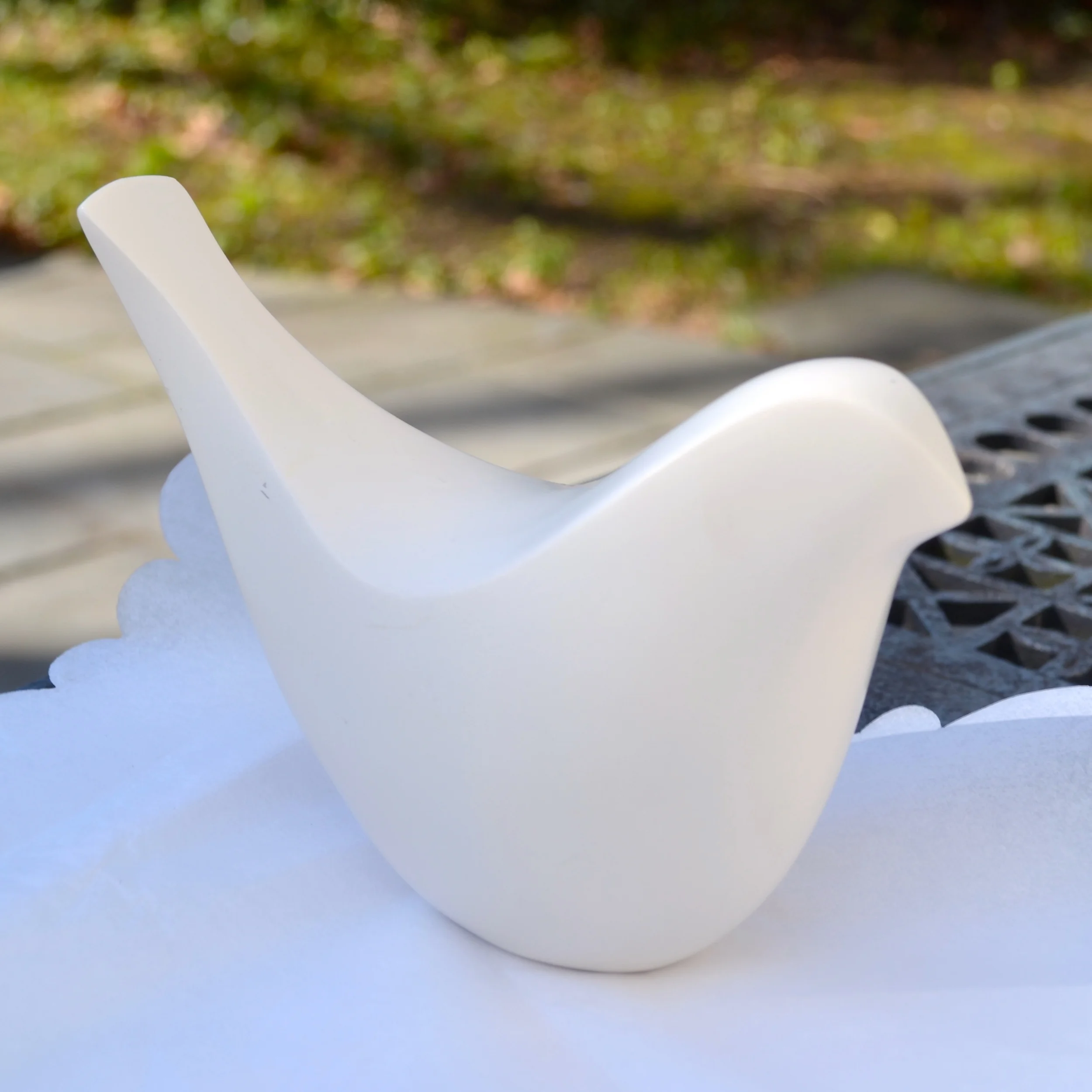 Modern Ceramic Bird Figurine from Target. Similar here . 