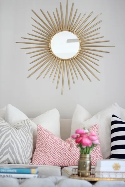 Get literal and literally bring the sun into your home with a sunburst mirror. Image via DecorPad
