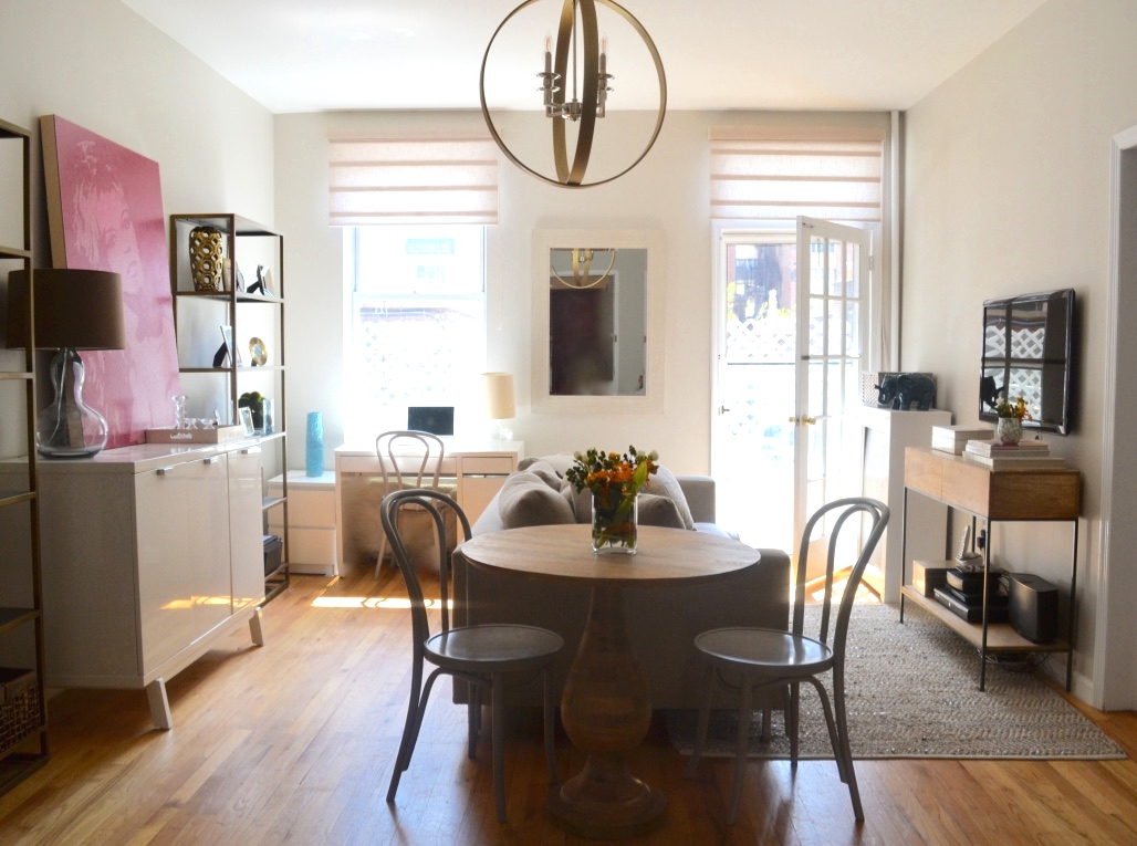 Small Space Division: I made the living room the ultimate workhorse by dividing it with the sofa. It's counterintuitive, but breaking up the room with furniture often makes it feel larger by giving it more depth and multiple functions. 