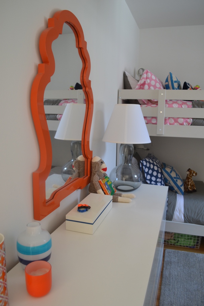 The blue for boy/pink for girl bedding is unified by the same pattern with the same gender-neutral duvet covers and shams.