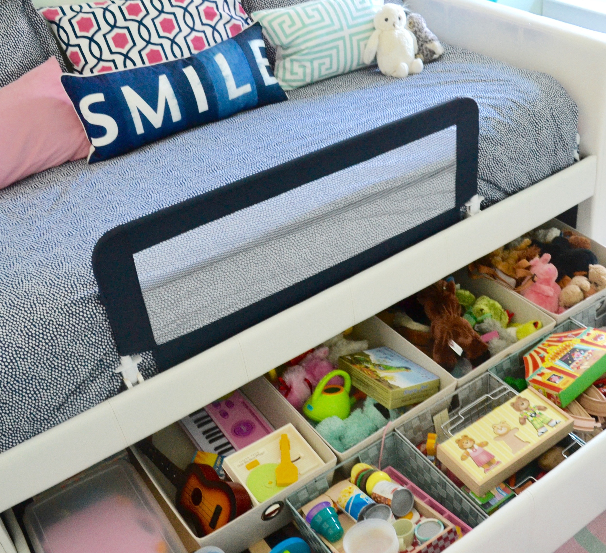 The daybed has a trundle drawer that allows for a mattress, but we opted to use it as toy storage instead by adding bins to compartmentalize. 