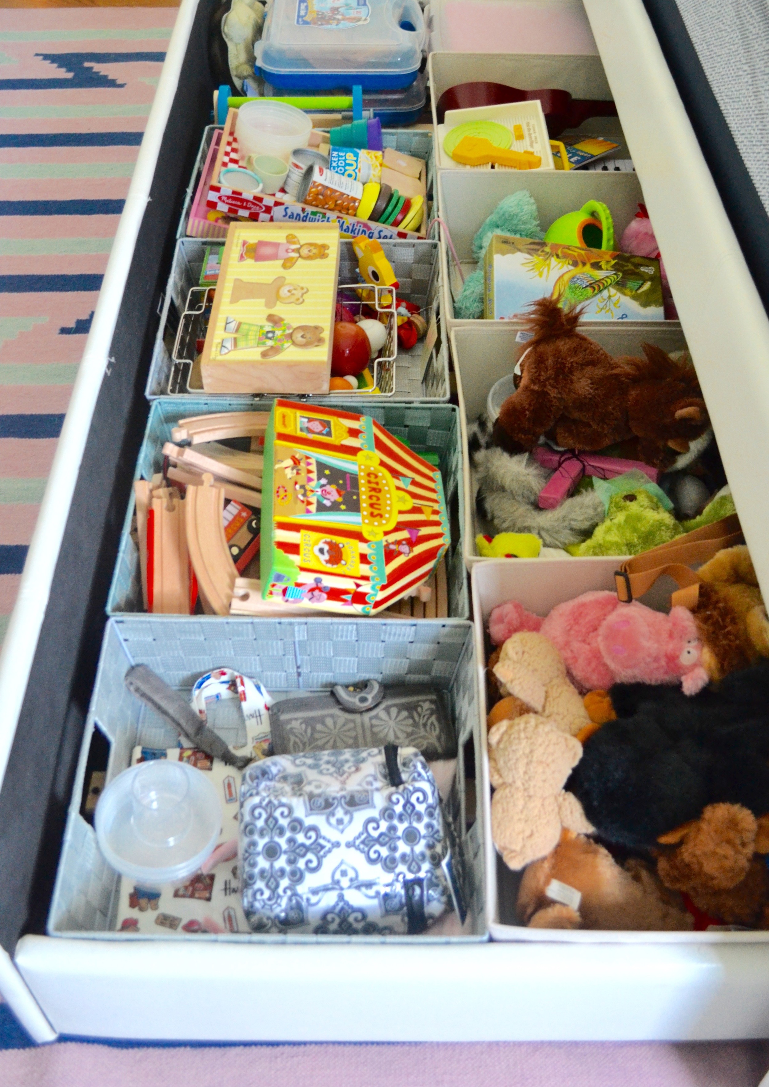 I did my best to categorize/organize, but as a mom of a toddler, I know that you could spend your life categorizing, sorting and putting away toys, only for your meticulous work to be adorably torn apart within minutes, so I didn't go too crazy! I bet my partner in organized design @shelfienyc could have a field day with this! (Don't forget to enter our instagram giveaway, details here .) 