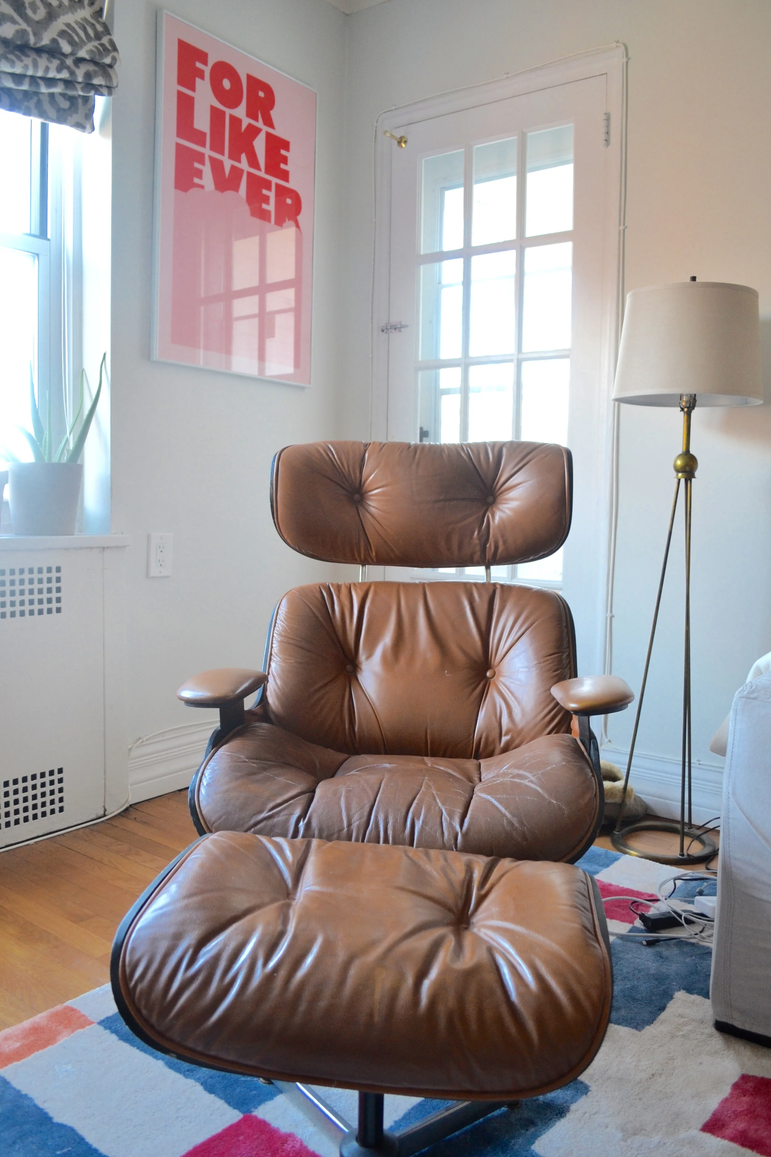 The leather Eames style Chair and Ottoman were a vintage find from Craigslist.