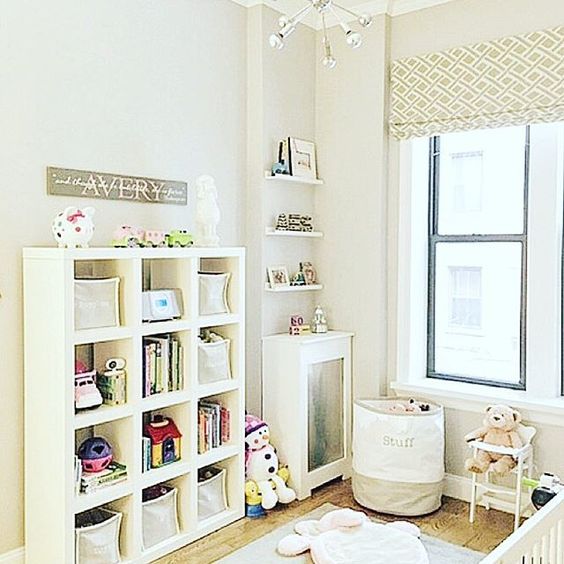 Sadly the Sputnik fixture by Shades of Light and the roman shade (made on Etsy) were sold as "fixtures" along with the apartment. But the white bookshelf and gray and white bins came with, so I wanted to work them into the new design.
