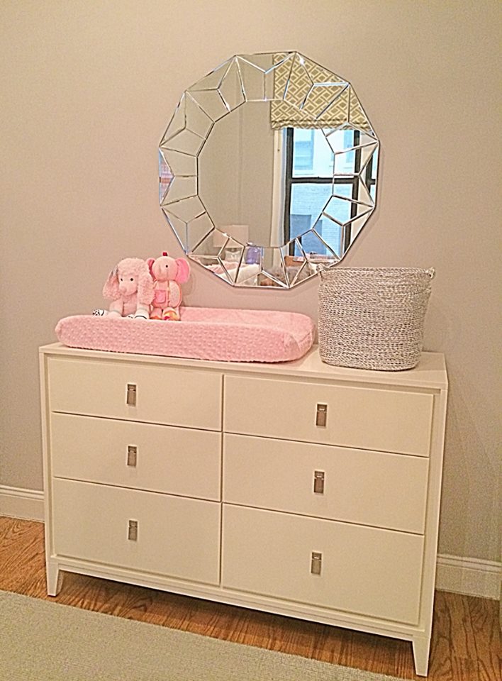 The West Elm dresser, changing pad, mirror and basket all came with.