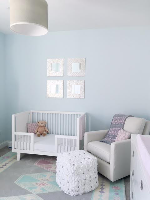 Drum light is from Shades of Light, and the swivel glider is by Bassett
