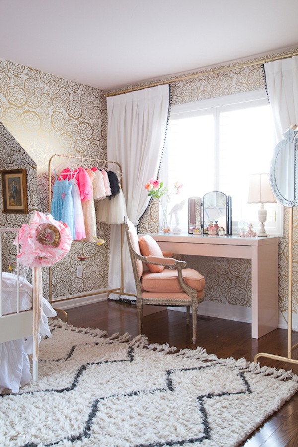 This vanity could just as easily be used as a desk in this cozy and chic little bedroom! Image via Style Me Pretty.