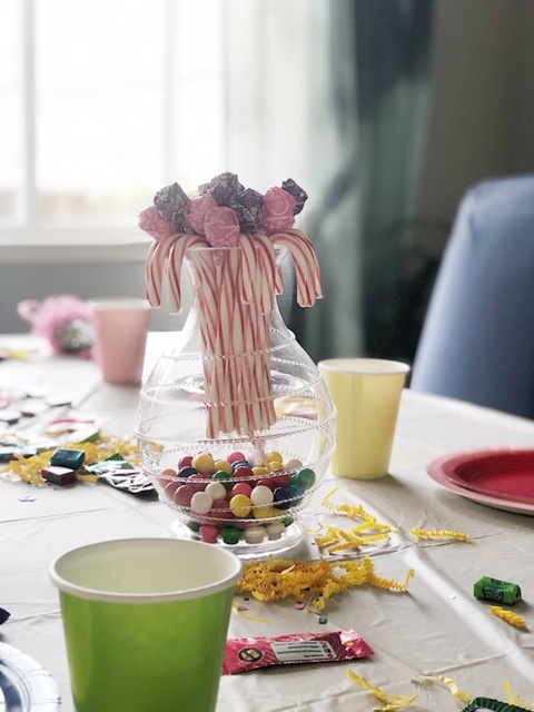 No table is complete without centerpieces. So grabbed vases that we already had and made these candy displays.