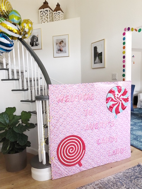 First things first, we had to block off these stairs, so the party animals didn't monkey around upstairs! I crafted this out of a giant box , tablecloth,  foil balloons, and stick on letters.