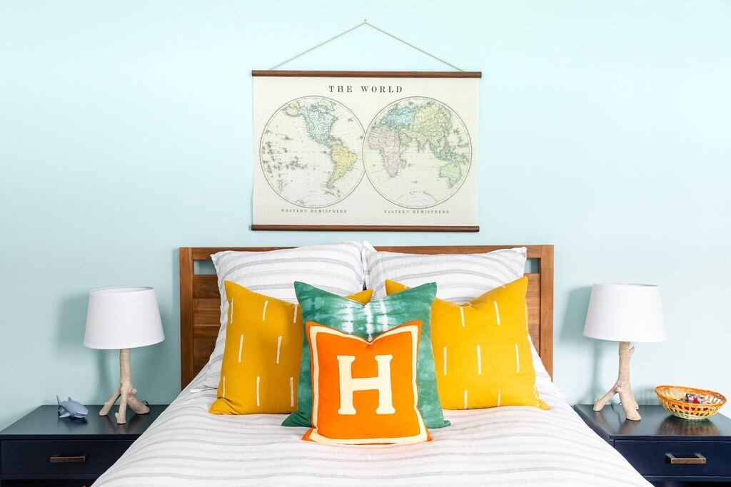 H is for ... Halloween is coming soon! Love this pop of orange against the cooler blue and green tones in this kids bedroom at our #seacliffsplendor project. ⁠
⁠
One thing I love to do in my designs is balance out the warm and cool tones. Although I 