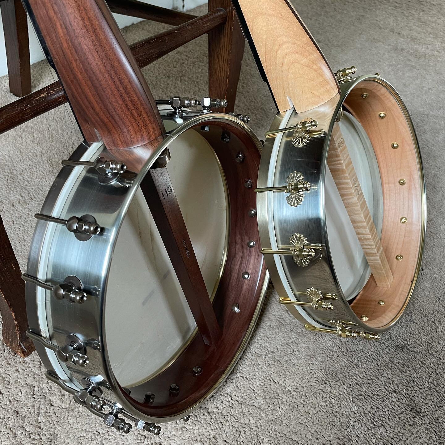 2 down, 3 to go in this batch. Feels so good to finish banjos again! Well, almost finished. The bridges on these are just used for the initial string up. Once the heads have had string pressure on them for a few days, then I make the actual bridges f