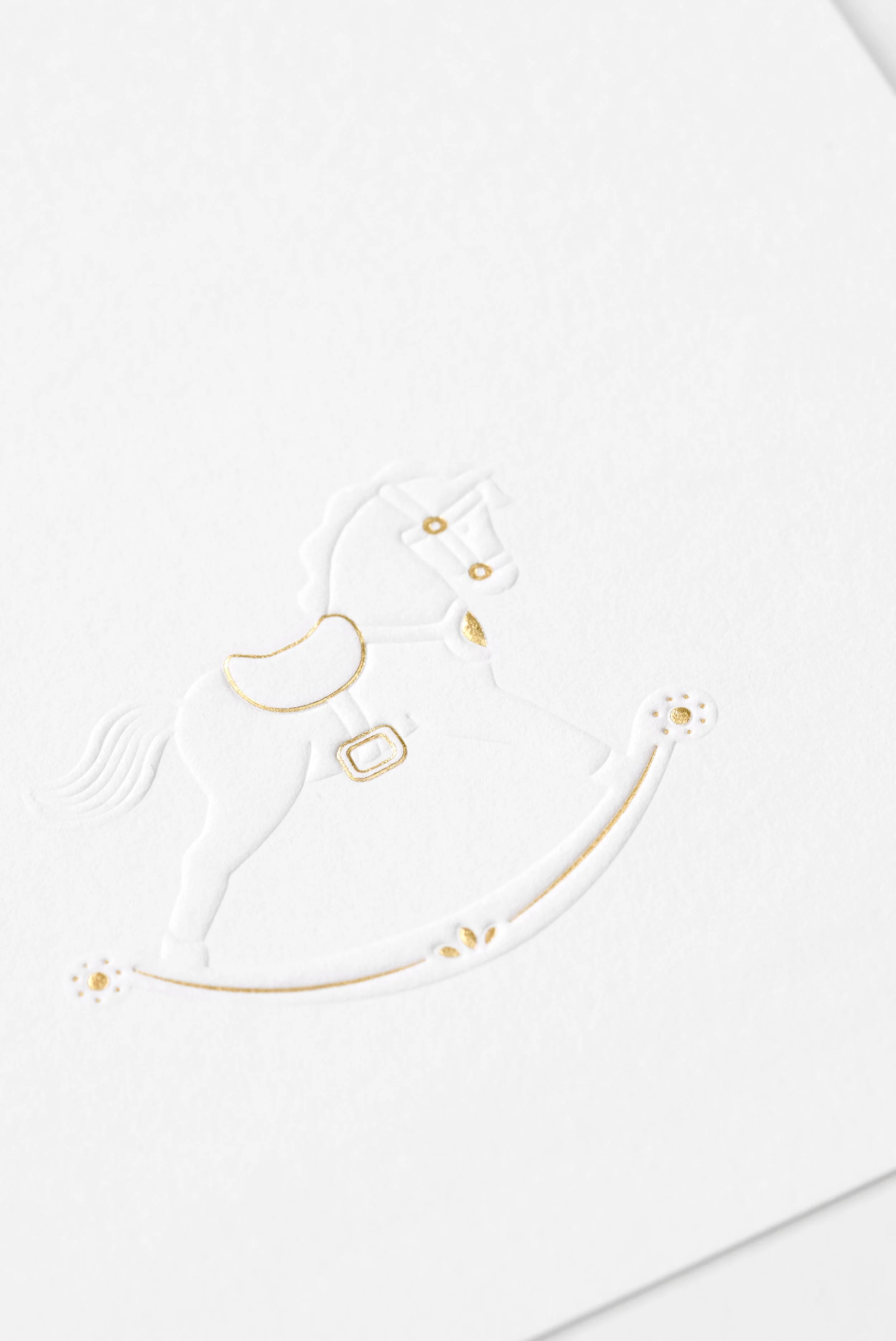 embossing schommelpaard elle et moi