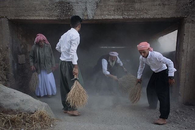 Men sweep up dust near the temple complex at Lalish in Iraqi Kurdistan, the most sacred place in the Yazidi faith. Today was the second day of Festival of Assembly, a sacred week where Yazidis make the pilgrimage here from all over the world. It is o