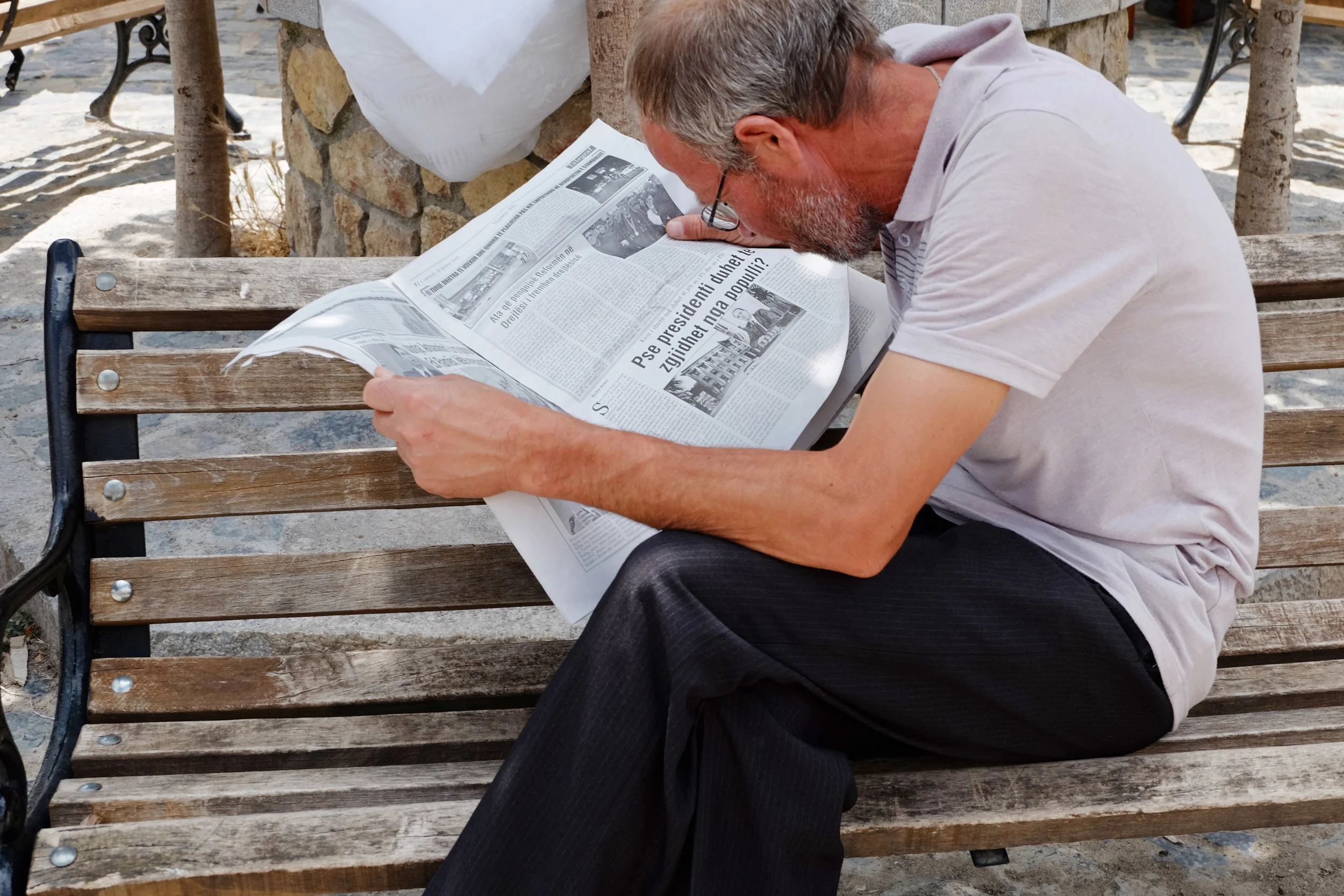 This gentleman was glued to his paper.