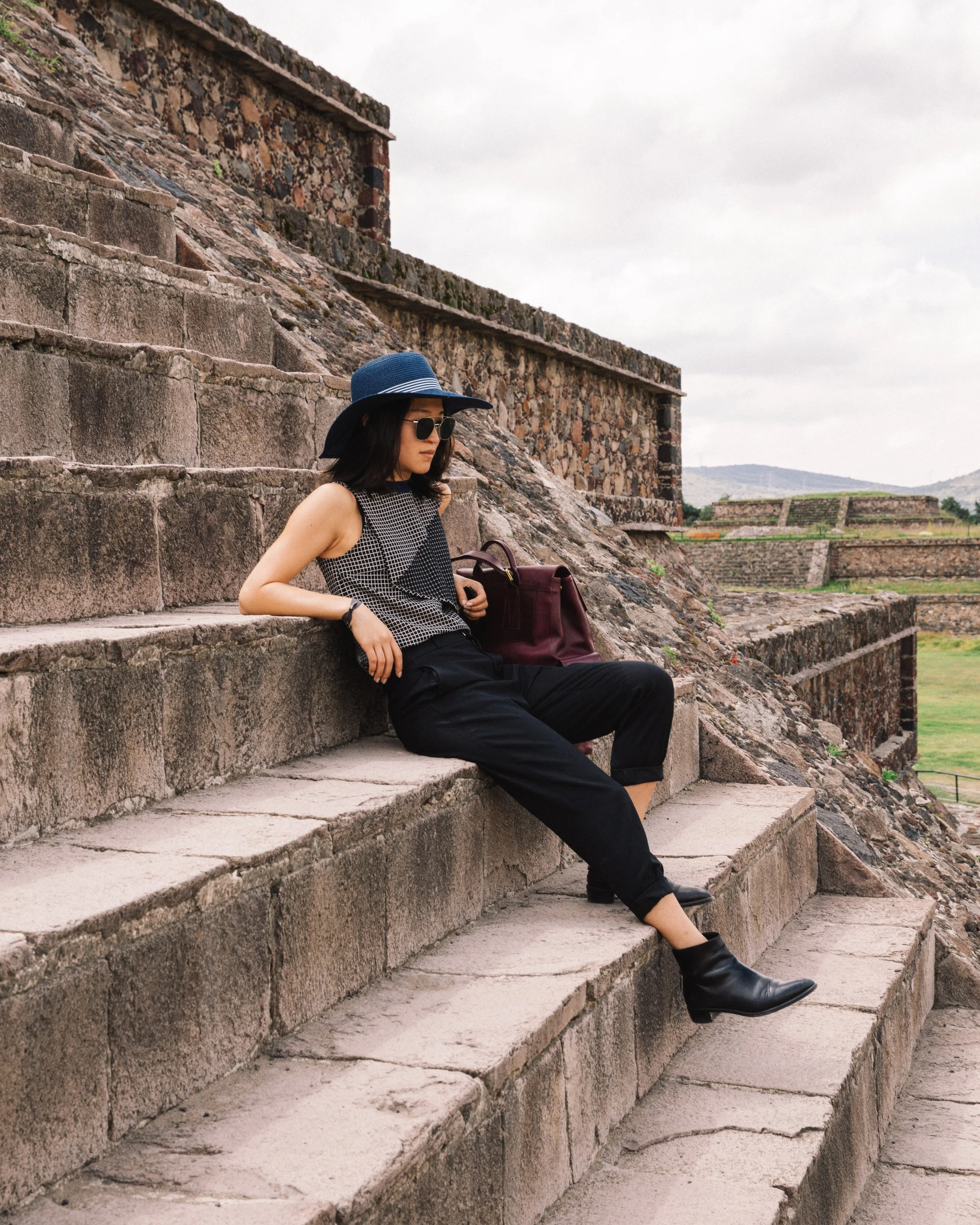 carven top, steven alan trousers, barneys ny leather boots, kent and curwen backpack, ahlem sunglasses, teotihuacan souvenir hat | photo by Daniel Han