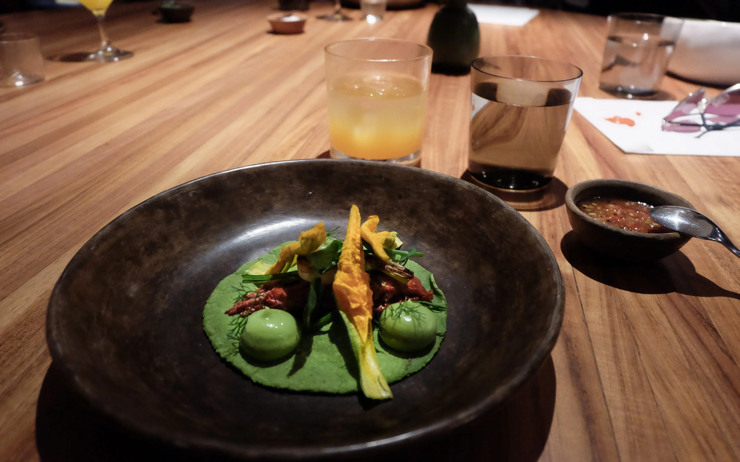 III. Suckling lamb taco, avocado leaf adobo, avocado puree