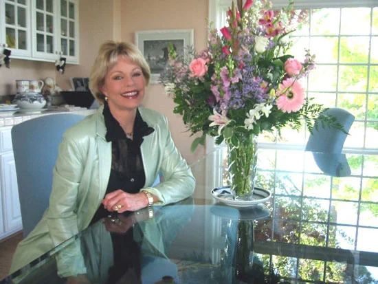 At home, enjoying the sunshine and fresh-cut flowers!