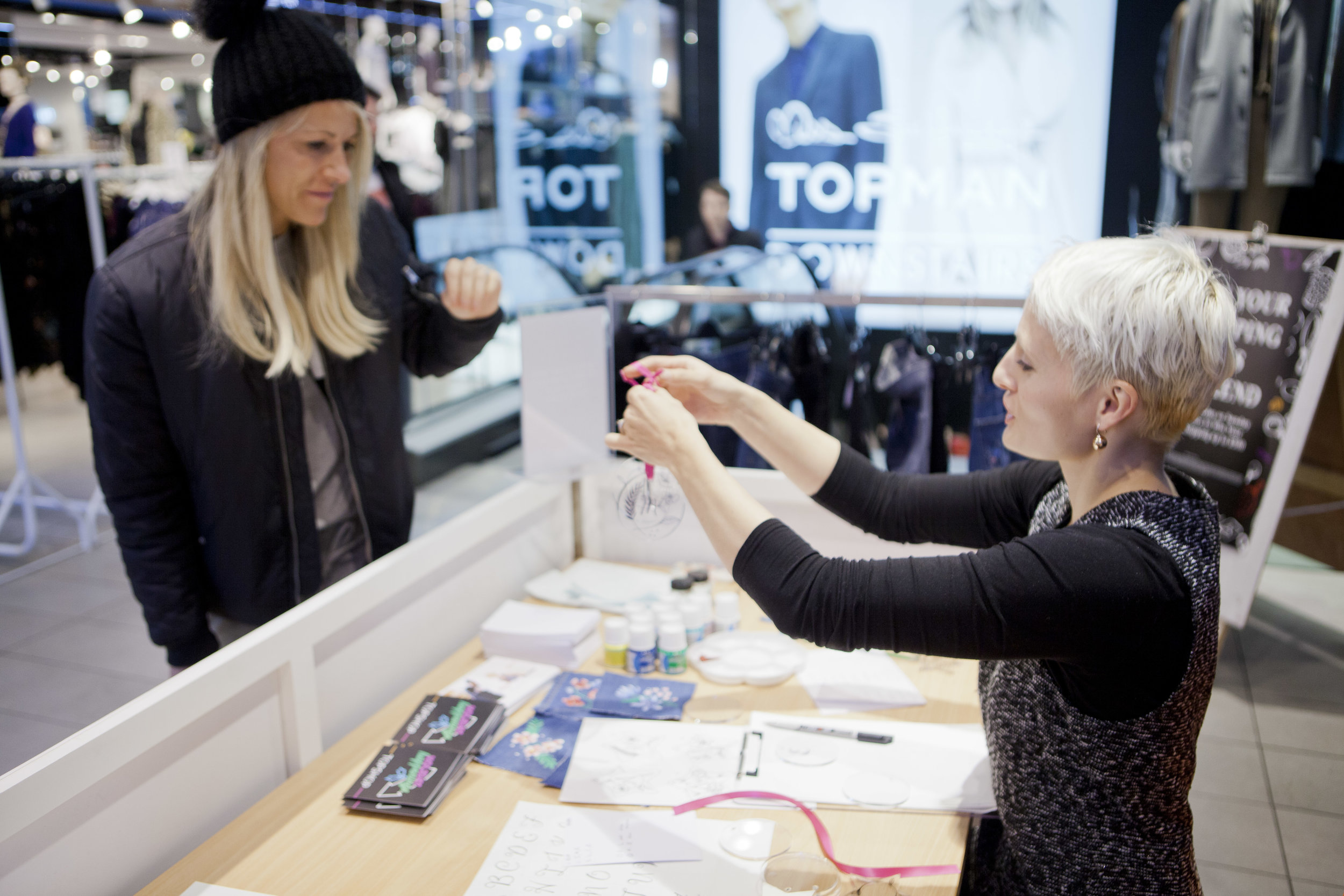 Hand drawn, personalisation of Christmas Baubles at Topshop