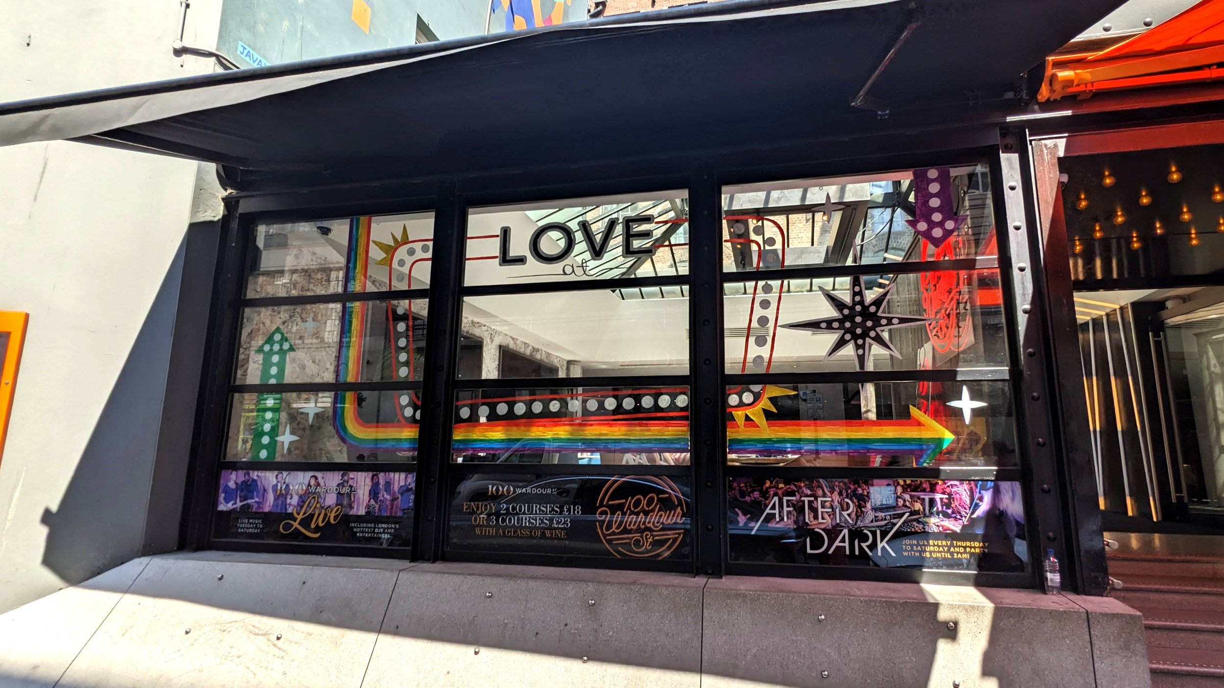 window painting for pride by Willa Gebbie