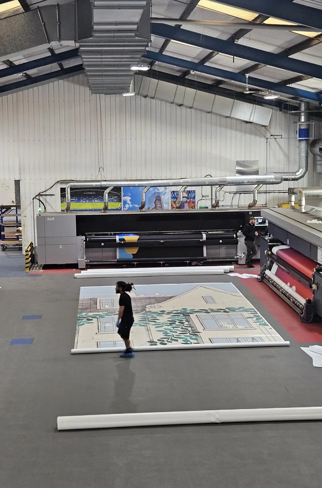  Behind the scenes at Moss Inc: printed hoarding panels featuring the bespoke line drawing created for the 1 Marylebone High Street redevelopment, prior to installation. 