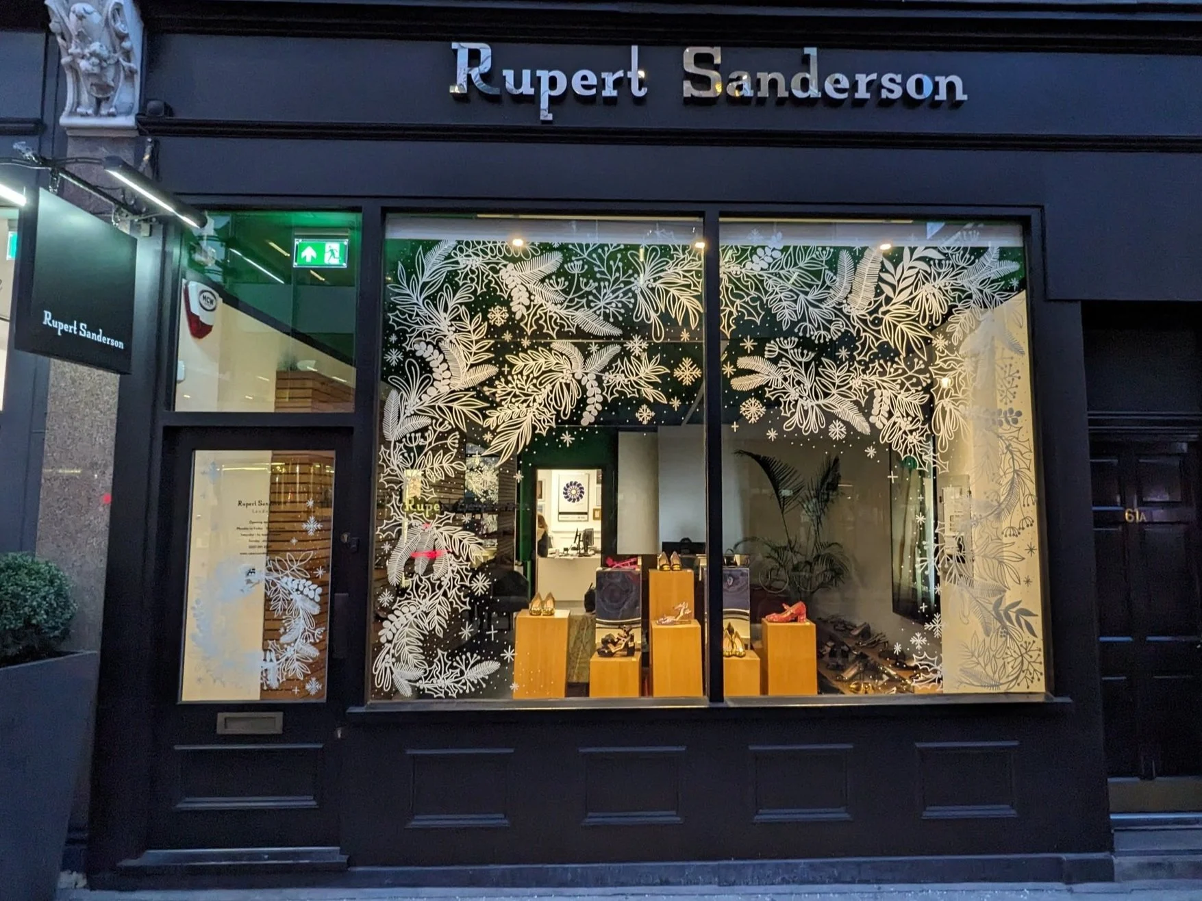 Window painting for Christmas at Rupert Sanderson