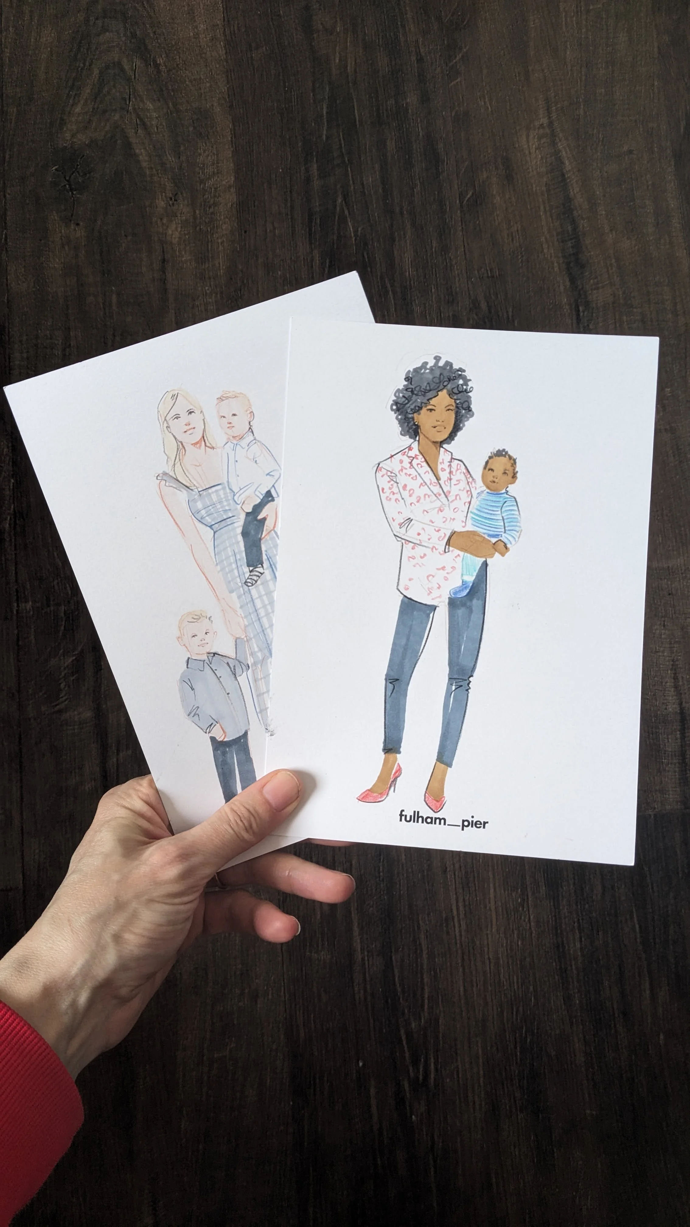 A live illustration of a mother and children drawn during a Mother's Day bottomless brunch event at Fulham Pier, London.